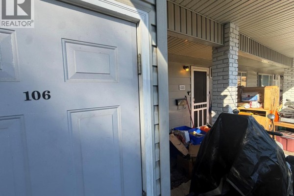 Exterior view of the entrance to unit 106 and adjacent unit doors. - 3712 24 Avenue Unit# 106, Vernon