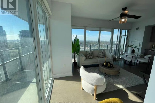 Indoor swimming pool area with lounge chairs and tiled flooring. - 3721 - 30 Shore Breeze Drive, Toronto