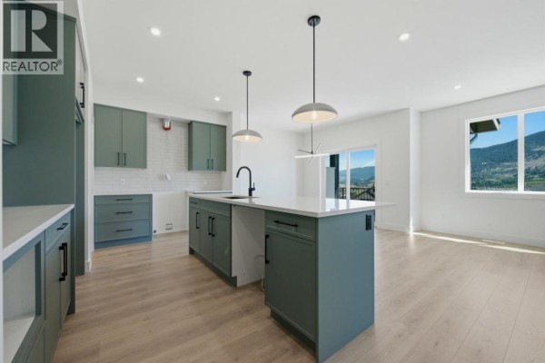 Laundry room - 377 Arrowleaf Rise, Coldstream, BC V1B0B5 Photo 5