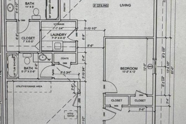Floor plan of a house with two bedrooms, two bathrooms, laundry room, and living area. - 379 Norwood Road, East Royalty