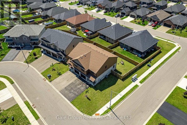 Aerial view of a suburban neighborhood with multiple townhouses and paved streets. - 38 Amber Street, Norfolk