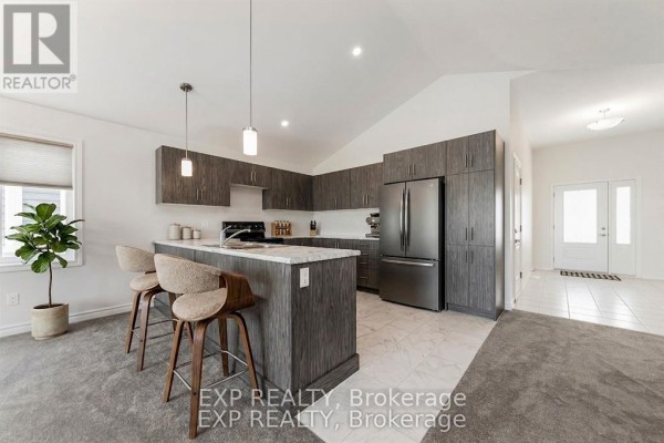 A bathroom with a marble-look vanity, toilet, and a white walk-in shower stall. - 38 Yade Road, Arnprior