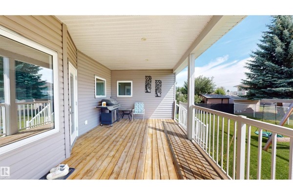Family room - 3809 52 Av, Drayton Valley, AB T7A1T7 Photo 4