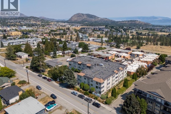 Aerial view of Leisure Terrace building and surrounding West Kelowna neighborhood. - 3815 Brown Road Unit# 107, West Kelowna