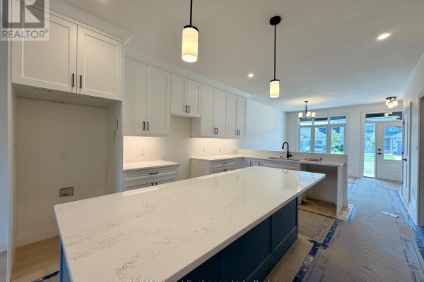 Unfinished interior living space with exposed subflooring and drywall. - 383 Rosner Drive, Saugeen Shores