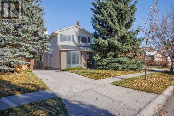 Family room - 383 Woodfield Road Sw, Calgary, AB T2W3V8 Photo 2