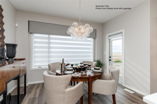 Dining space with access to outdoor patio and large windows - 384 Irene Road, West St Paul