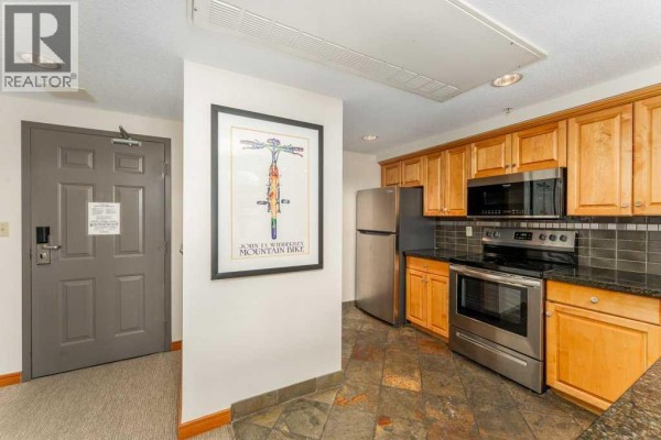 Living room - 386, 91b Three Sisters Drive, Canmore, AB T1W3M1 Photo 5