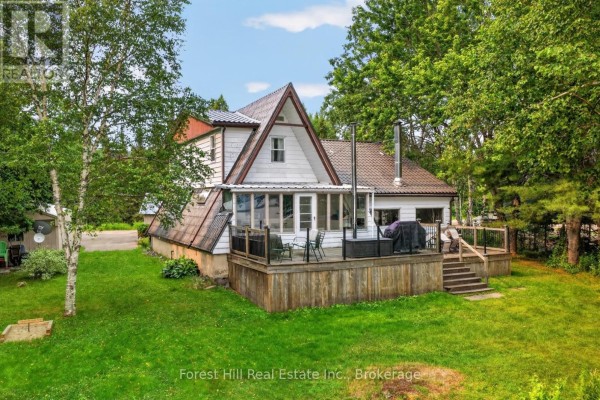 Bedroom with a double bed, ceiling fan, and light-colored decor. - 388 Crescent Road, Strong