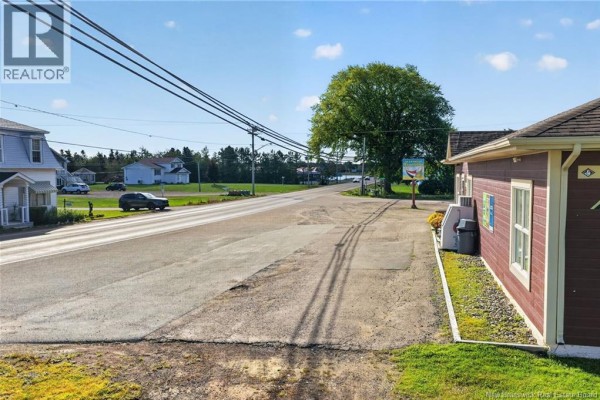 View from the side of a commercial building looking down the road. - 3881 Route 134, Shediac Bridge