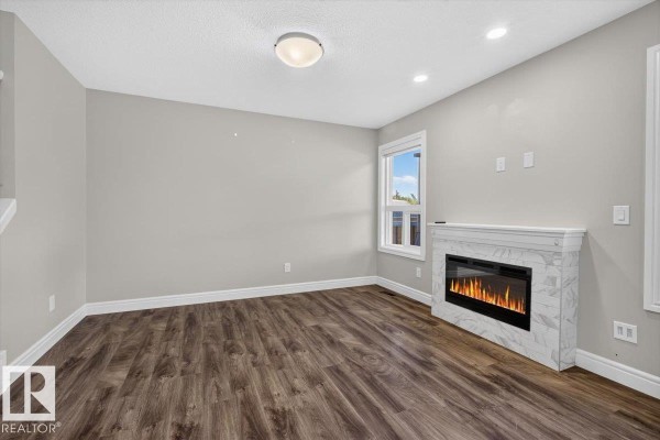 Family room - 3885 Robins Cr Nw, Edmonton, AB T5S0M8 Photo 4