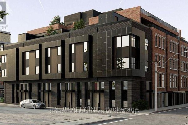 Contemporary townhouse exterior with dark metal panels, brick accents, and street-level entrances. - 39 River Street, Toronto