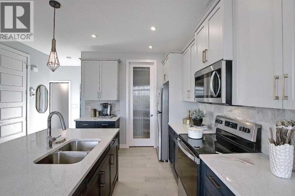 2pc Bathroom - 39 Waterford Mews, Chestermere, AB T1X3B4 Photo 2