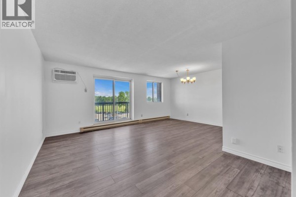 Living room - 3950 Wyandotte Street East Unit# 505, Windsor, ON N8Y1G5 Photo 4
