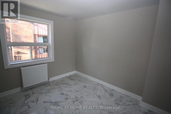 Living room - 4 - 2 Glen Gordon Road, Toronto, ON M6P1B8 Photo 3