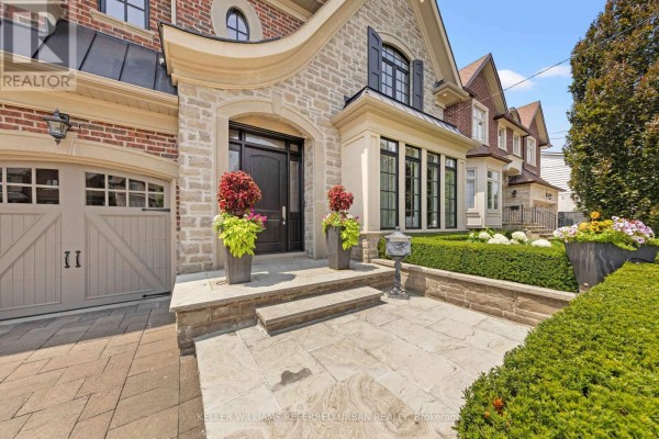Backyard with a swimming pool, patio furniture, and surrounded by manicured trees and a fence. - 4 Community Circle, Toronto