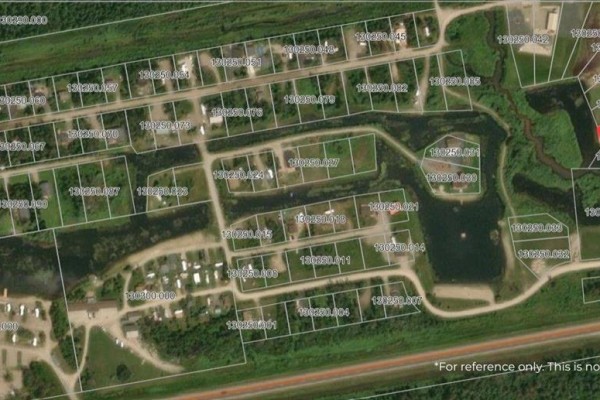 Aerial map of a developed area with numerous rectangular lots, water features, and roads. - 4 Falcon West Drive, Falcon Lake