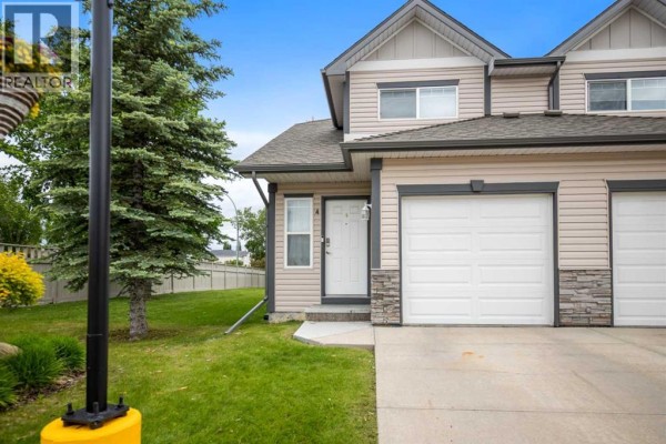 Living room - 4 Millview Green Sw, Calgary, AB T2Y3W1 Photo 2