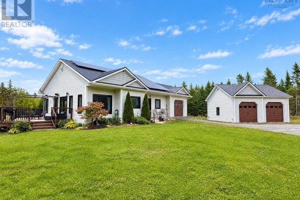 Exterior view of the light gray house with a detached two-car garage. - 40 Naveen Lane, Antigonish