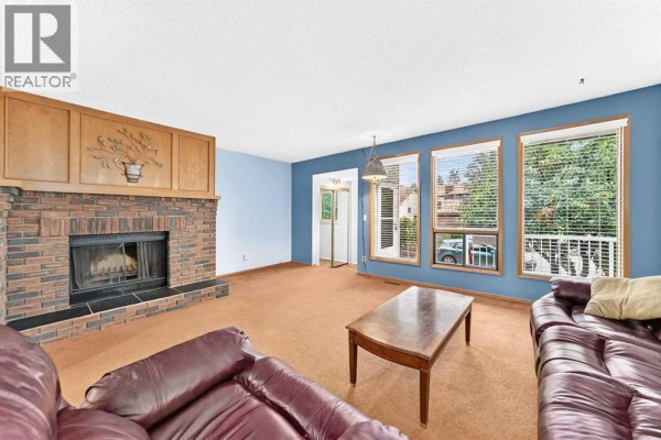 Living room - 4008 46 Street Sw, Calgary, AB T3E6P3 Photo 2