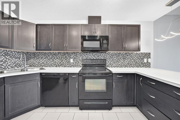 Laundry room - 401, 1320 1 Street Se, Calgary, AB T2G0G8 Photo 5