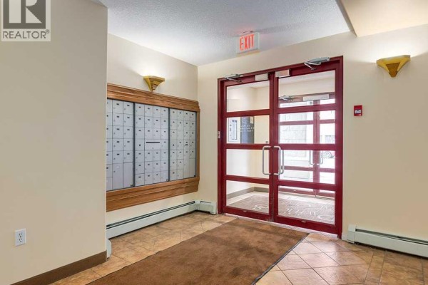 Primary Bedroom - 401, 777 3 Avenue Sw, Calgary, AB T2P0G8 Photo 4