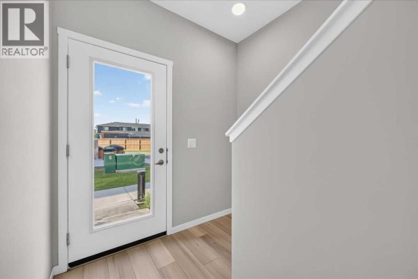 Living room/Dining room - 401, 81 Midtown Boulevard Sw, Airdrie, AB T4B4E7 Photo 4