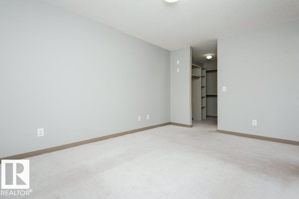 Bedroom 2 - 401 5005 165 Av Nw Nw, Edmonton, AB T5Y0L8 Photo 4
