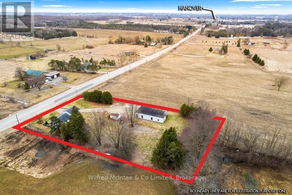 White building on property with red boundary lines, fields, and road - 401395 Grey Rd 4 West Grey