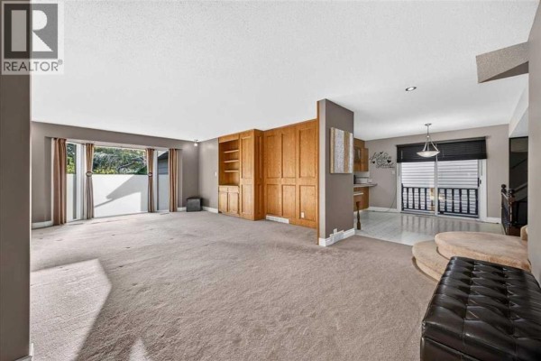 Family room - 4015 45 Street Sw, Calgary, AB T3E6P2 Photo 4
