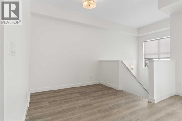 Bedroom - 402, 24 Rivercrest Drive, Cochrane, AB T4C2C8 Photo 4