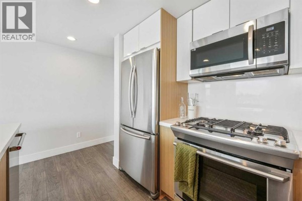 Living room - 402, 519 Riverfront Avenue Se, Calgary, AB T2G1K6 Photo 4