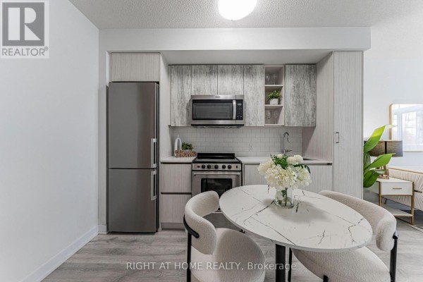 Dining room - 402 - 251 Manitoba Street, Toronto, ON M8Y0C7 Photo 4