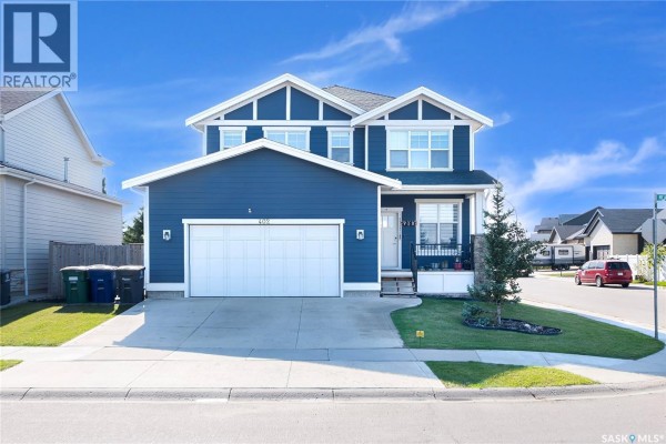 Living room - 402 Meadows Boulevard, Saskatoon, SK S7V0E7 Photo 3