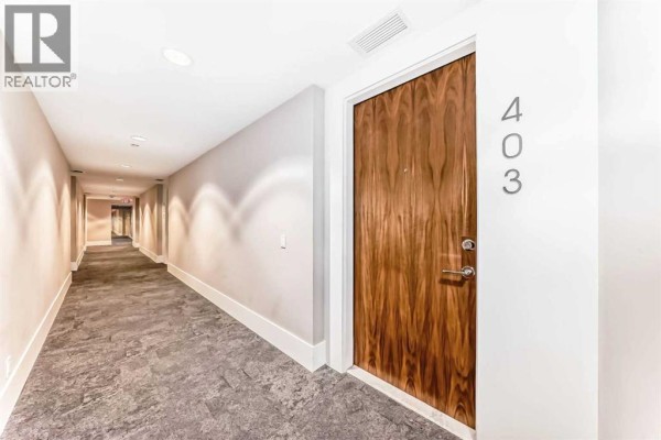 Primary Bedroom - 403, 1025 5 Avenue Sw, Calgary, AB T2P1N4 Photo 4