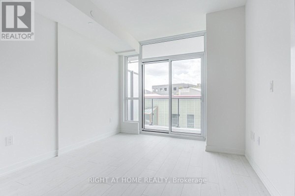 Primary Bedroom - 403 - 10 De Boers Drive, Toronto, ON M3J0L6 Photo 4