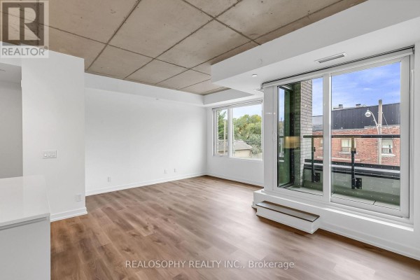Bedroom 2 - 403 - 115 Larchmount Avenue, Toronto, ON M4M2Y6 Photo 4