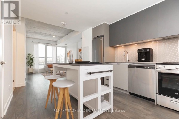 Living room - 403 - 57 Brock Avenue, Toronto, ON M3H3N2 Photo 3