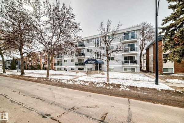 Front view of Brisdon Manor from the street, showcasing balconies and entrance. - #403 10624 123 St Nw, Edmonton