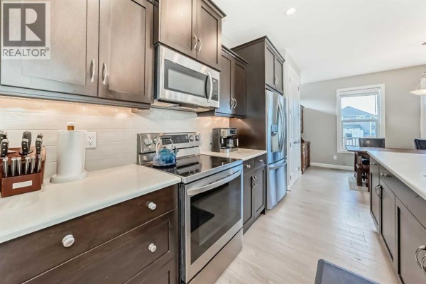 Dining room - 403 River Heights Crescent, Cochrane, AB T4C0T9 Photo 5