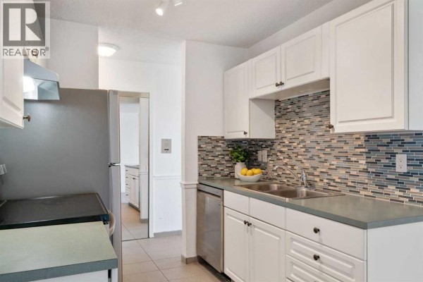Primary Bedroom - 404, 1113 37 Street Sw, Calgary, AB T3C1S5 Photo 5