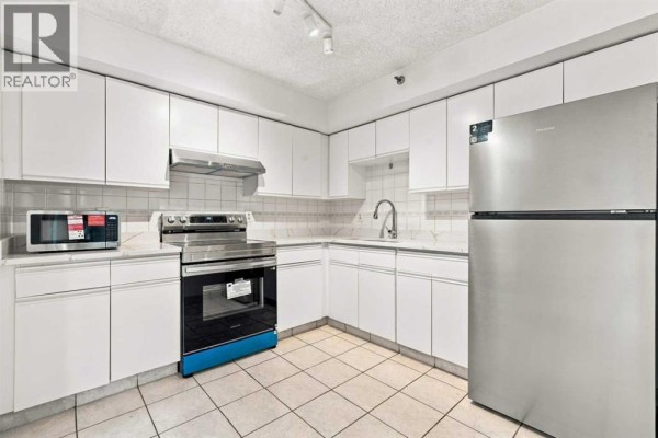 Dining room - 404, 128 2 Avenue Se, Calgary, AB T2G5J5 Photo 4