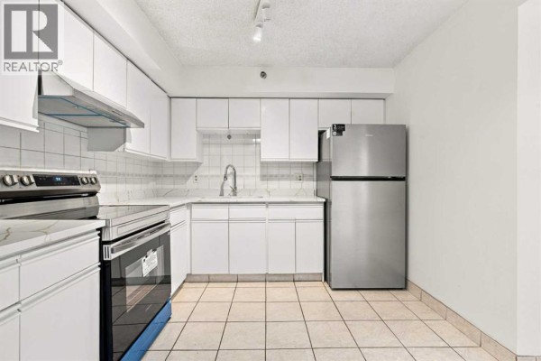 Bedroom - 404, 128 2 Avenue Se, Calgary, AB T2G5J5 Photo 5