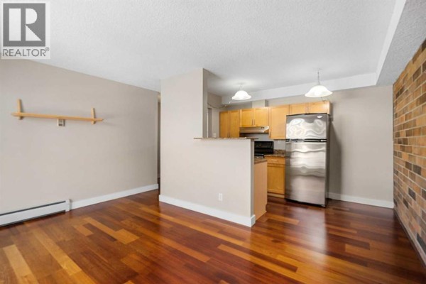 Primary Bedroom - #404, 315 9a Street Nw, Calgary, AB T2N1T7 Photo 4