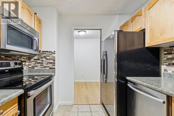 Living room - 404, 537 14 Avenue Sw, Calgary, AB T2R0M7 Photo 3
