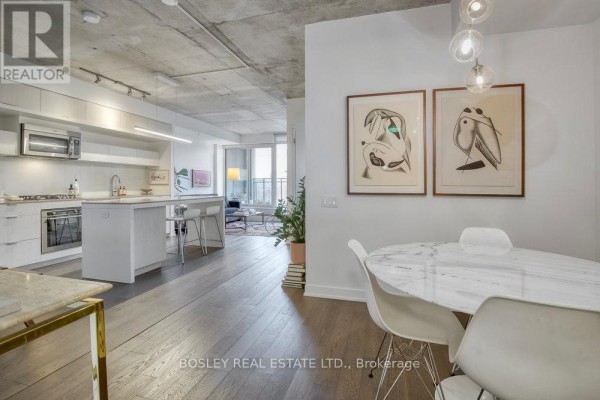 Living room - 404 - 130 Rusholme Road, Toronto, ON M6H1A7 Photo 4