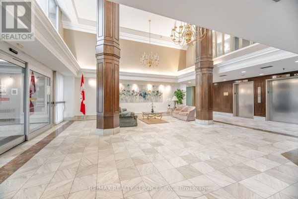 Living room - 404 - 330 Mill Street S, Brampton, ON L6Y3V3 Photo 3