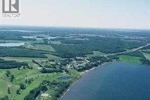 Aerial overview of a vast rural landscape with scattered trees, fields, and bodies of water. - 404-13352 Lakeland, Rural Lac La Biche County