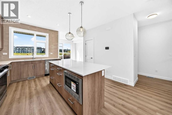 Living room - 405, 199 Sage Hill Heights Nw, Calgary, AB T3R2B2 Photo 4