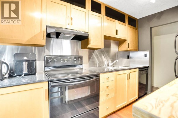 Kitchen - 405, 823 19 Avenue Sw, Calgary, AB T2T0H6 Photo 4
